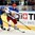 MINSK, BELARUS - MAY 24: Sweden's Tim Erixon #4 and Russia's Yevgeni Malkin #11 battle for the puck during semifinal round action at the 2014 IIHF Ice Hockey World Championship. (Photo by Richard Wolowicz/HHOF-IIHF Images)